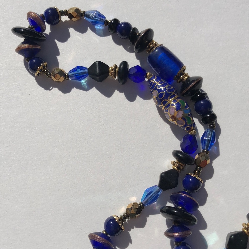 Multi colored necklace with matching earrings.